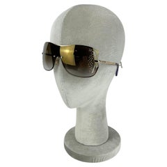 Swarovski Cole Viola e Cristallo Oro Oversize con Lente a Scudo