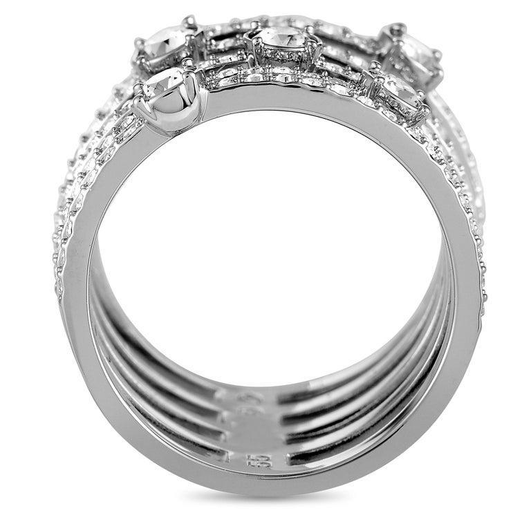 This Swarovski ring is made out of stainless steel and crystals and weighs 8.5 grams. It boasts band thickness of 4 mm and top height of 2 mm, while top dimensions measure 14 by 16 mm. Offered in brand new condition, this item includes the