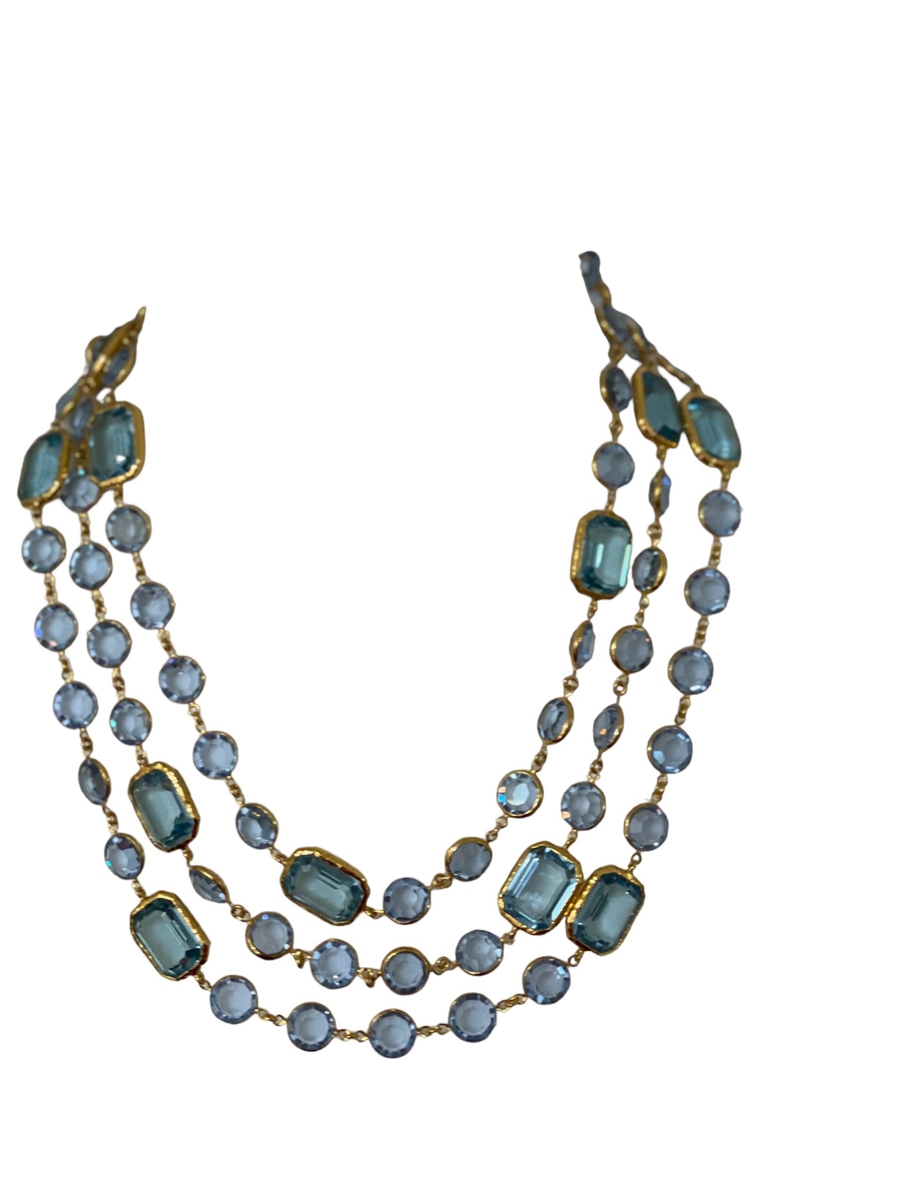 This necklace is reminiscent of the iconic chicklet design from the 80s. Aqua blue rectangle and round bezeled Swarovski crystals set on Vermeil( silver plated gold)..
Its length allows to wear it doubled, tripled and also as a lariat.
Wrap it