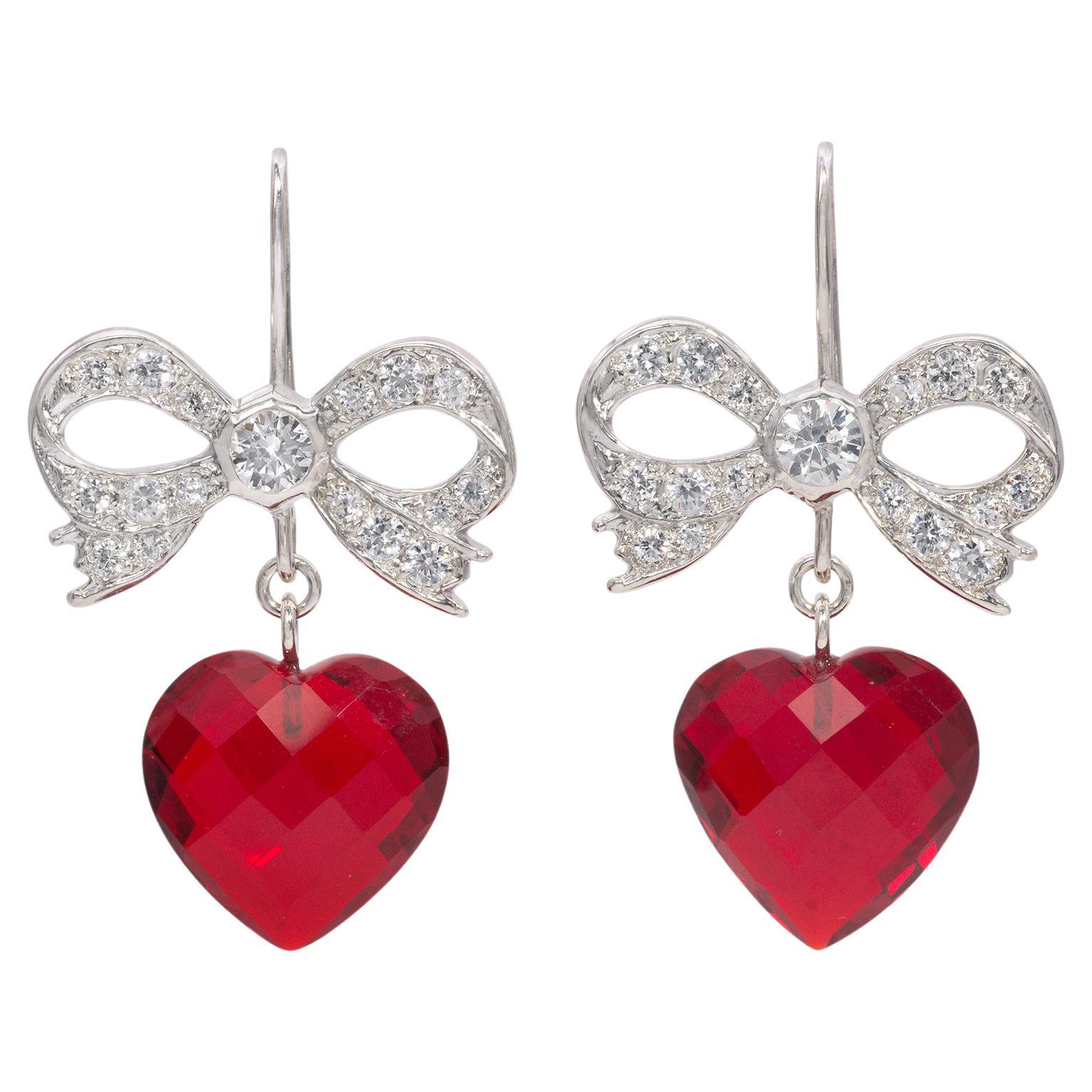        Swarovski Crystal Bow and Heart Earrings                     For Sale