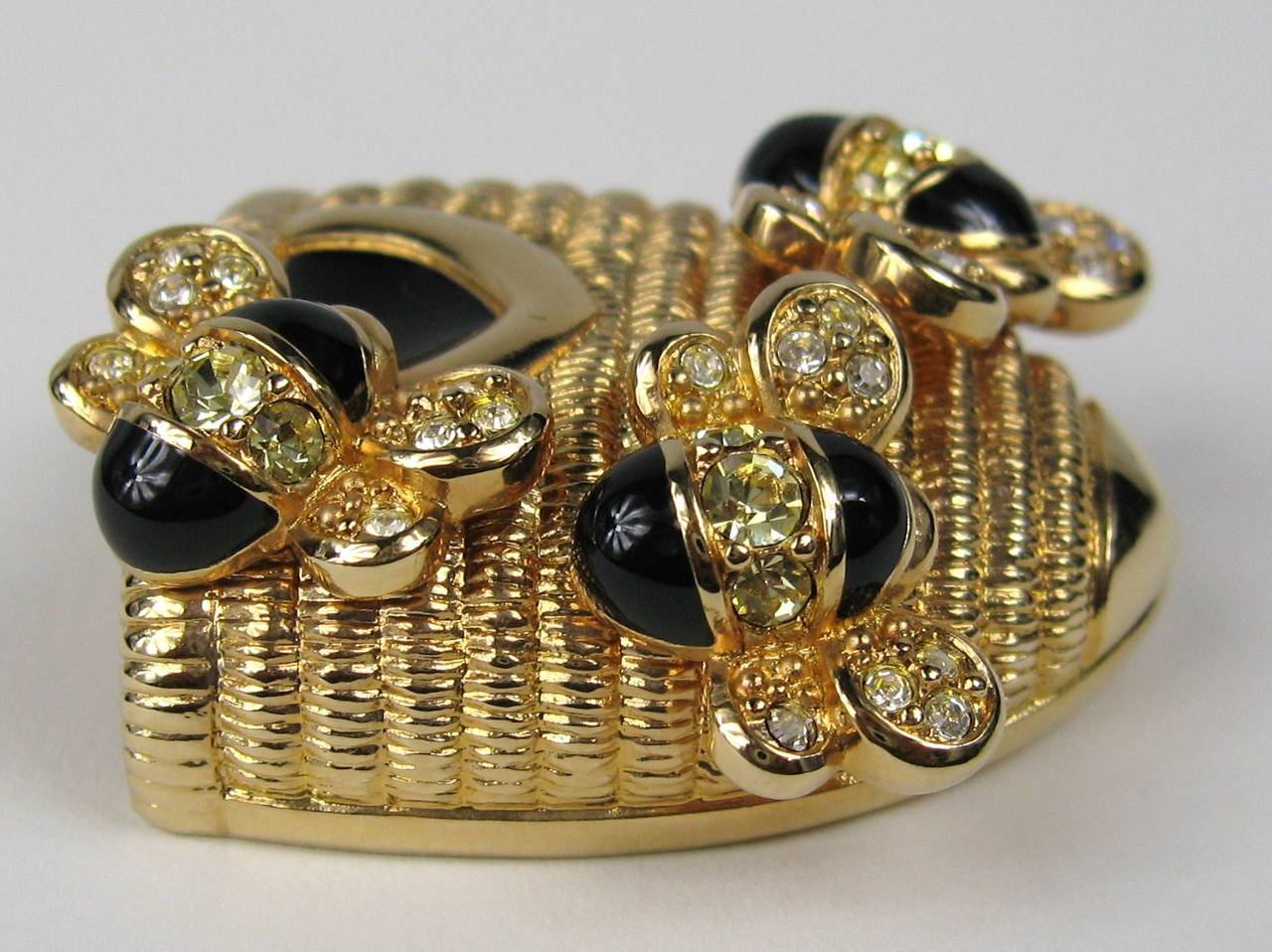 Stunning black enamel mixed with Swarovski crystals make up this Glitz Brooch Gold Gilt Bumble Bee. Another New, never worn 1990s Brooch, purchased back in the late 80s and stored away till now!  Measuring 1.64 inches x 1.47 inches.  This is out of