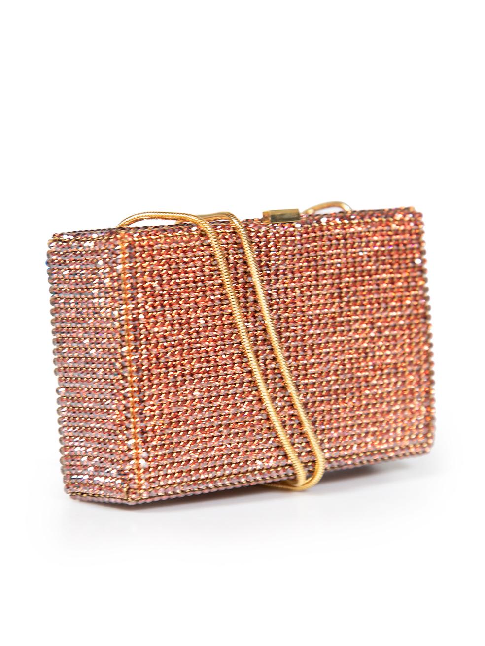 CONDITION is Very good. Minimal wear to bag is evident. There are some scratches and abrasions to the leather lining, and one crystal missing from the edge of the bag on this used Swarovski designer resale item.
 
 Details
 Metallic orange
 Crystal
