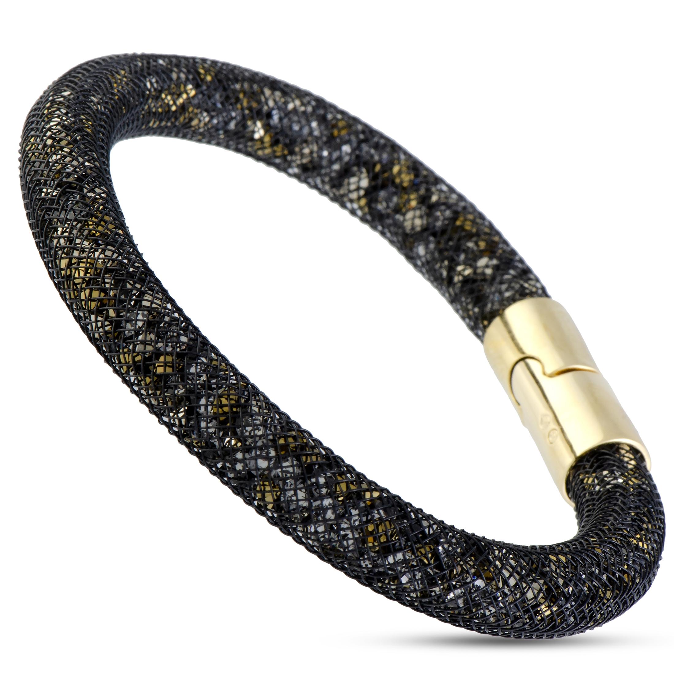 One of the most fascinating expressions of the iconic Stardust style, this astonishing necklace and bracelet set from Swarovski boasts exceptionally sparkling and intriguingly diverse crystals placed inside gracefully smooth and intricately designed