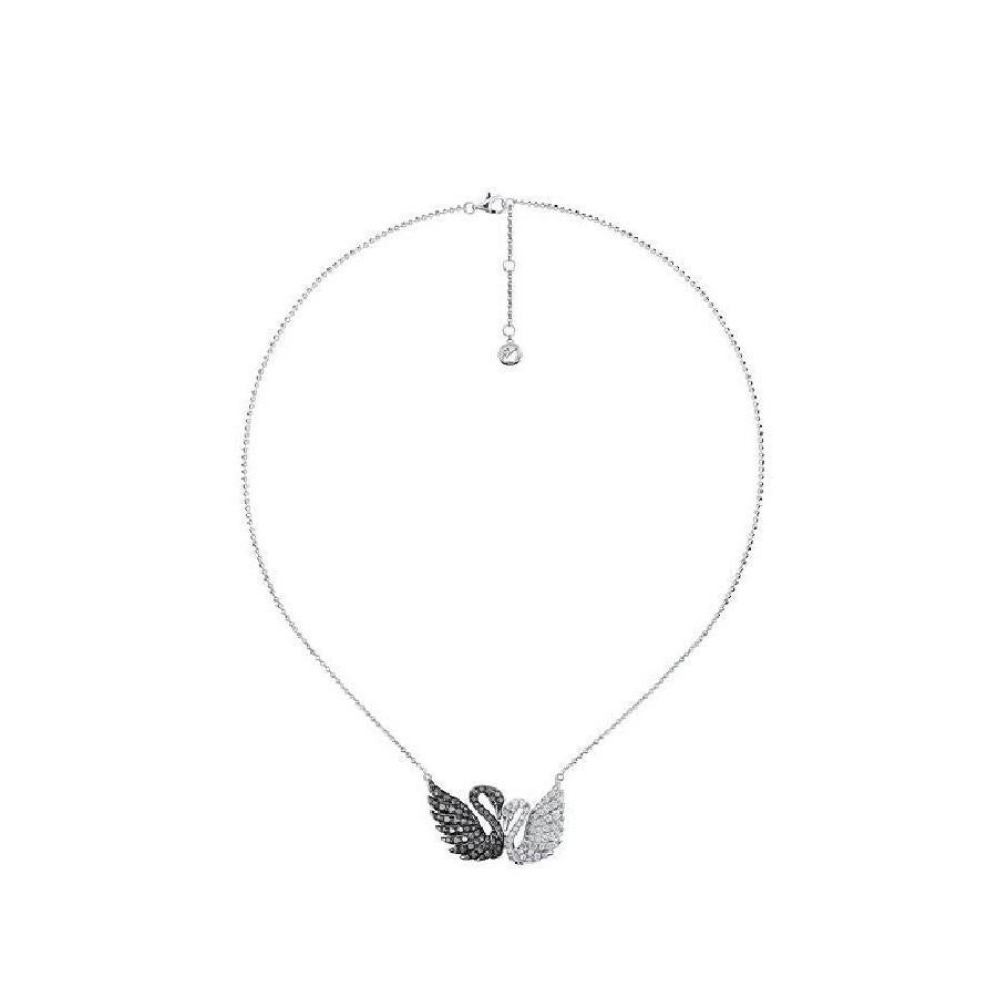 SWAROVSKI DOUBLE SWANS NECKLACE.
Features a pair of swan intimately lean against each other, symbolizing love and nobility.

- 18K White Gold
- Black Diamond and White Diamond Setting
- Adjustable length: 43 (40+3) cm
- Pendant 1