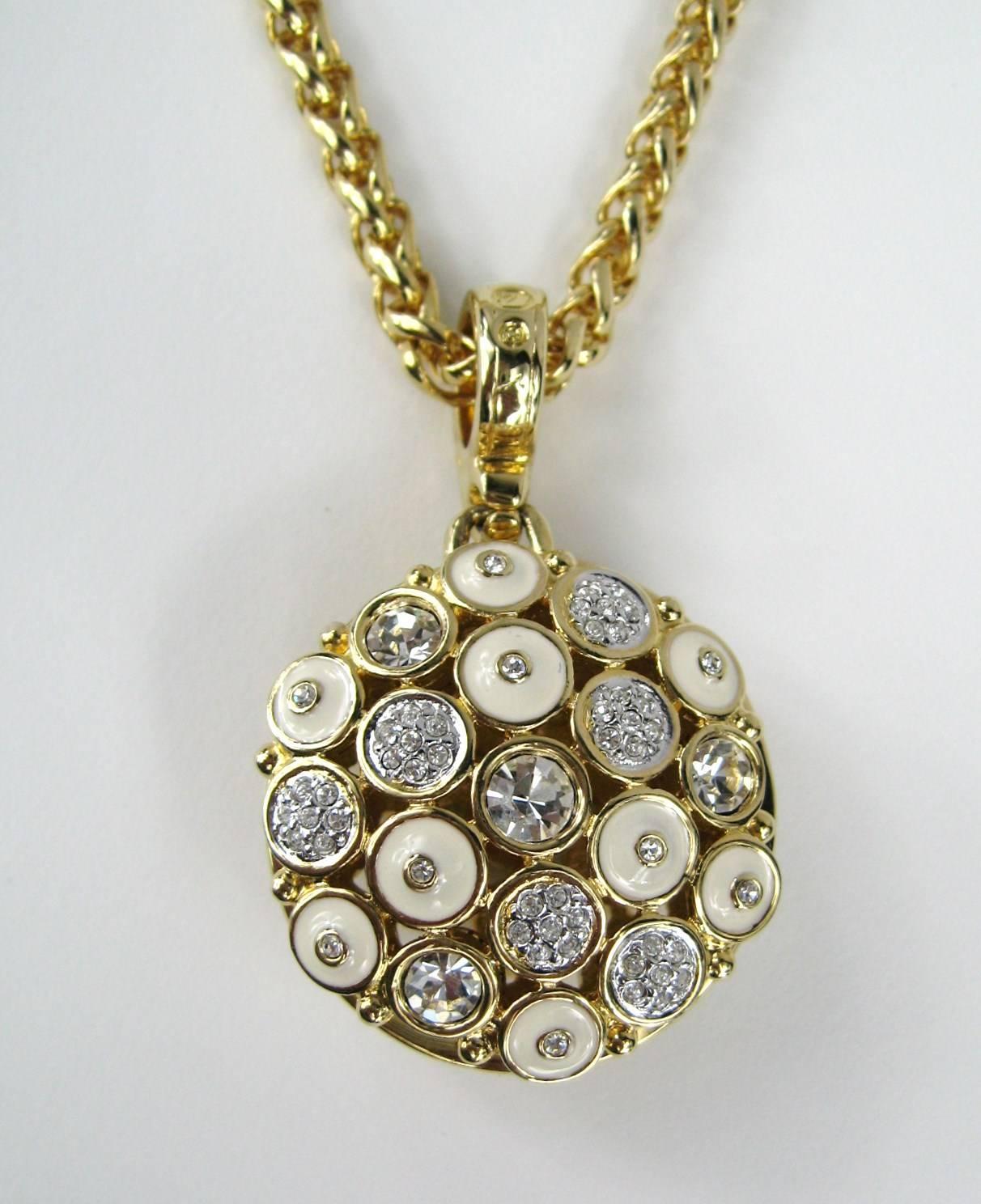 Swarovski Crystal & Enamel Disc Pendant w. Chain. This has Large & small bezel set Crystals alternating with enamel circles, pictures don't show how amazing this necklace is! Hallmarked on the bale & clasp of necklace measures: 1.3 in in diameter x