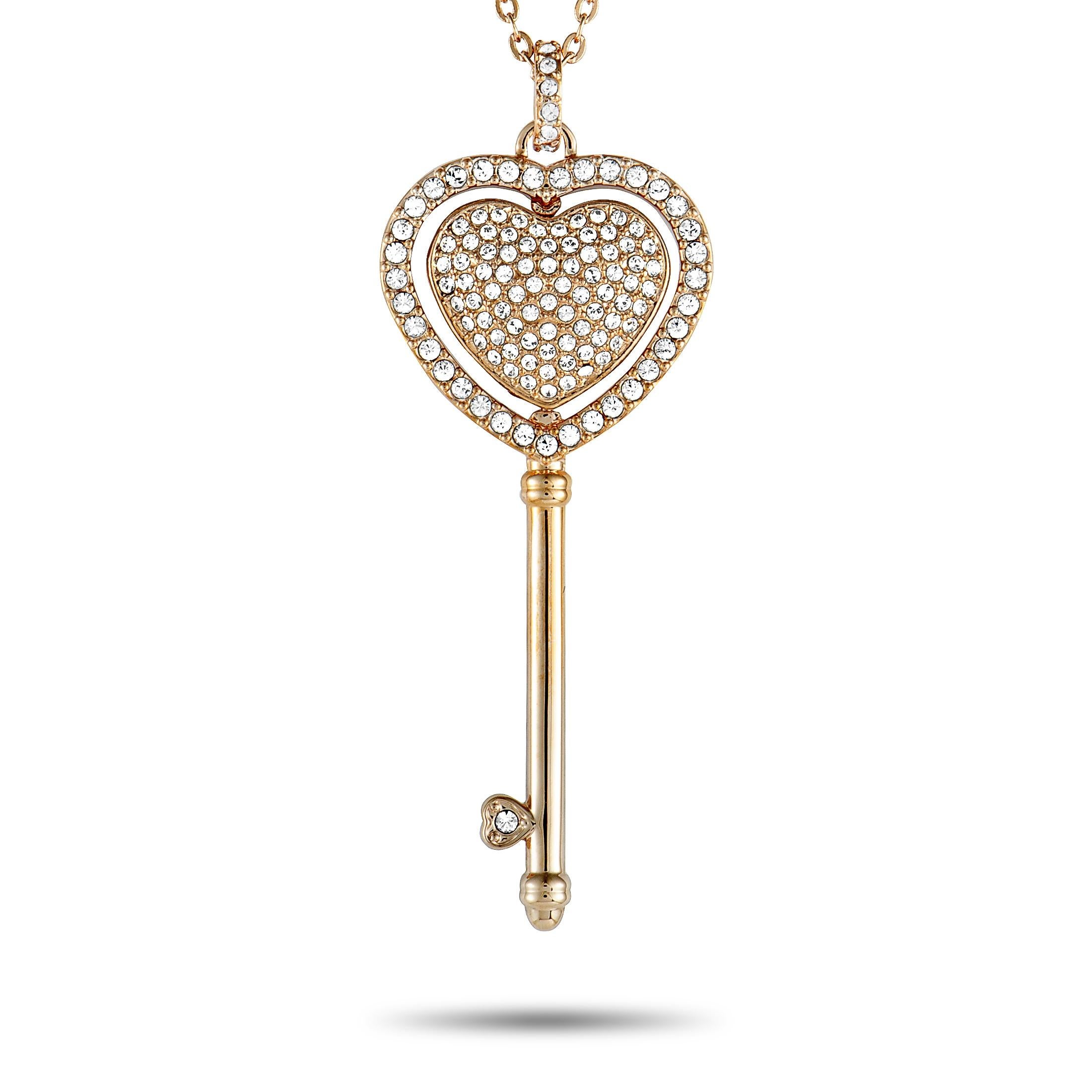 The “Engaged Heart” set by Swarovski is embellished with crystals and includes a necklace and a pair of earrings.
 
 The earrings measure 0.30” by 0.30” and each of the two weighs 1.2 grams. They boast push back closure. The necklace weighs 30