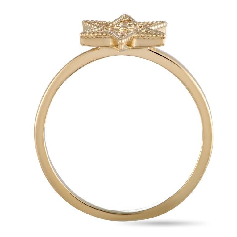 The yellow gold-plated â€œFieldâ€ ring by Swarovski is set with crystals and weighs 1.5 grams. It boasts band thickness of 2 mm and top height of 3 mm, while top dimensions measure 11 by 9 mm. Offered in brand new condition, this item includes the