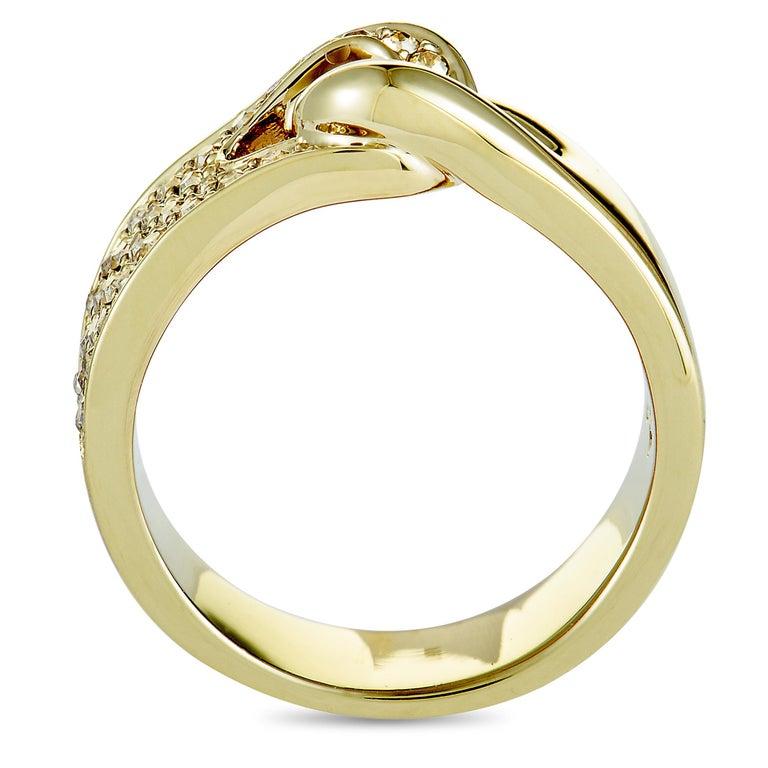 The gold-plated â€œGallonâ€ ring by Swarovski is set with crystals and weighs 5.8 grams. It boasts band thickness of 5 mm and top height of 4 mm, while top dimensions measure 15 by 6 mm. Offered in brand new condition, this item includes the