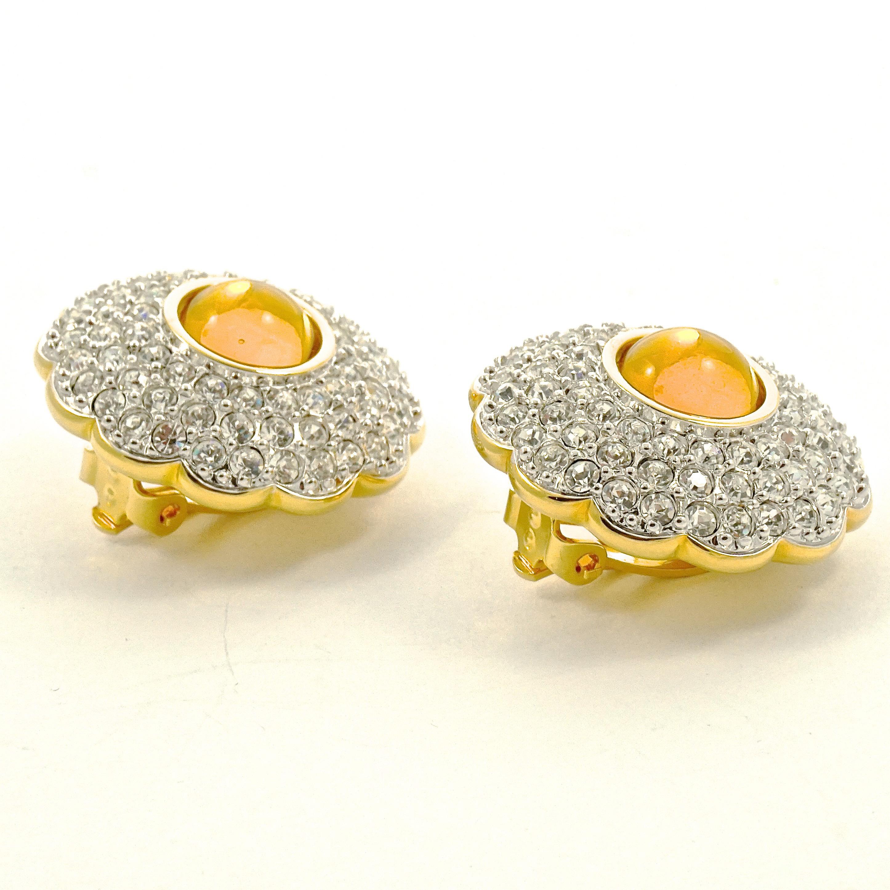 Round Cut Swarovski Gold Plated Amber and Clear Pavé Crystal Swan Logo Clip On Earrings For Sale