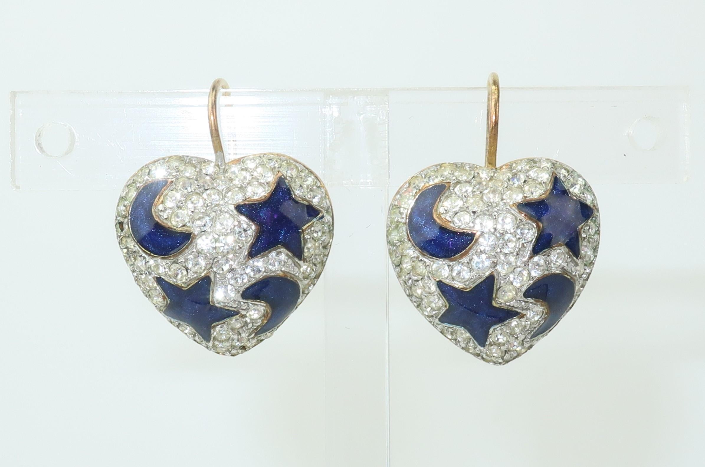 Aim for the stars and shoot for the moon!  These Swarovski crystal heart earrings are a lovely combination of sparkling stones and deep blue enamel in celestial star and moon shapes.  Outfitted with fish hook ear wires and lever backs for easy wear.