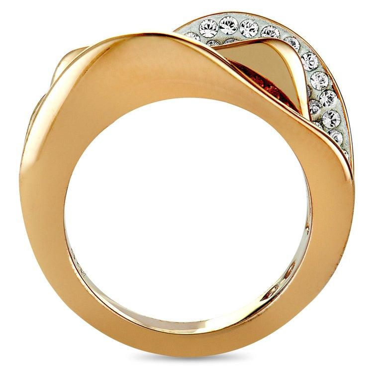 The rose gold-plated â€œHillyâ€ ring by Swarovski is set with crystals and weighs 6 grams. It boasts band thickness of 4 mm and top height of 6 mm, while top dimensions measure 24 by 9 mm. Offered in brand new condition, this item includes the