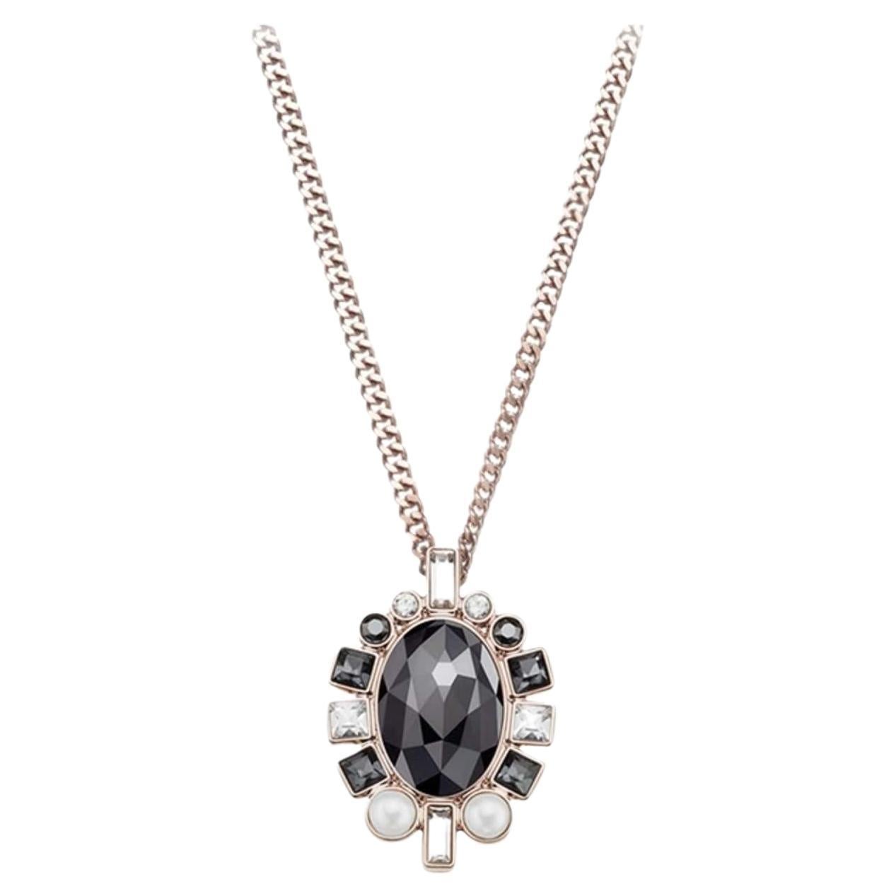 Collana con ciondolo di cristalli floreali ovali bianchi e neri di Swarovski, tonalità oro rosa

Ottime condizioni. 100% autentico.

Lunghezza: 44 cm, allunga la catena di 6 cm. Ciondoli: 2,8*2,0 cm.

_ _ _

Ottimo per essere indossato tutti i