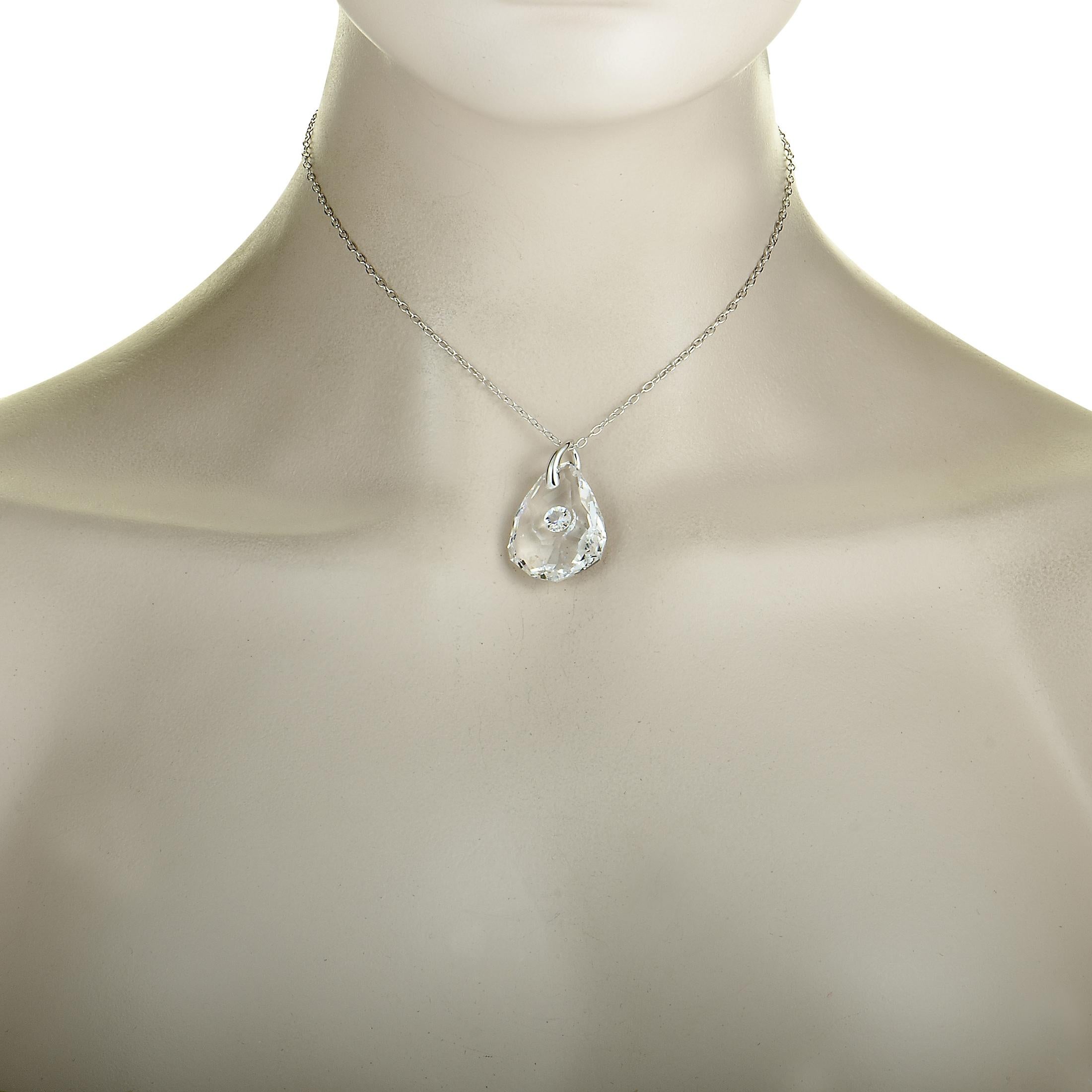 The “Life” necklace by Swarovski is presented with a 14.00” chain that features lobster claw closure, and boasts a crystal pendant that measures 1.37” in length and 0.87” in width. The necklace weighs 11.7 grams.
 
 This jewelry piece is offered in