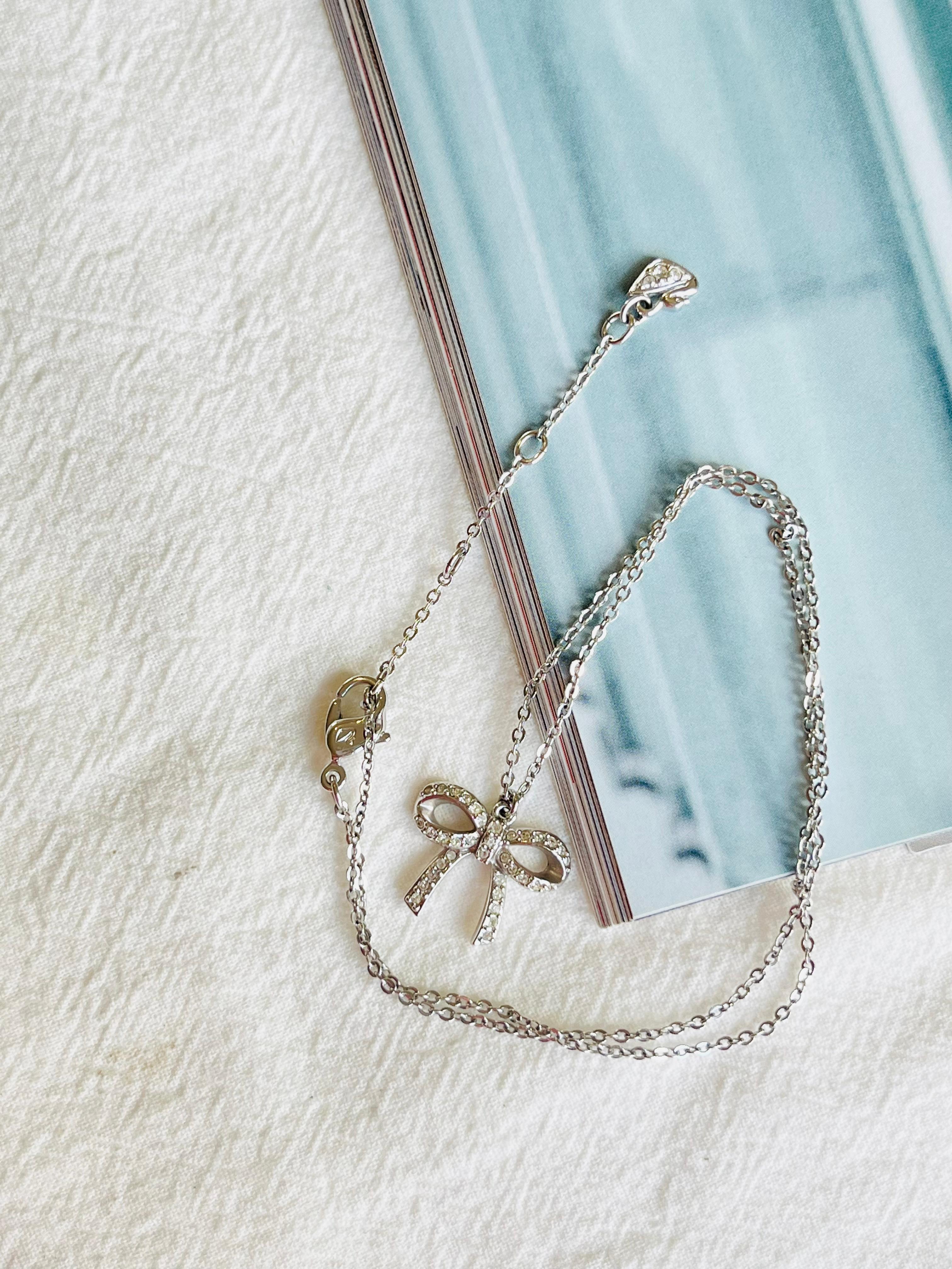 Art Nouveau Swarovski Lifelong Knot Bow Crystals Pendant Cute Elegant White Silver Necklace For Sale