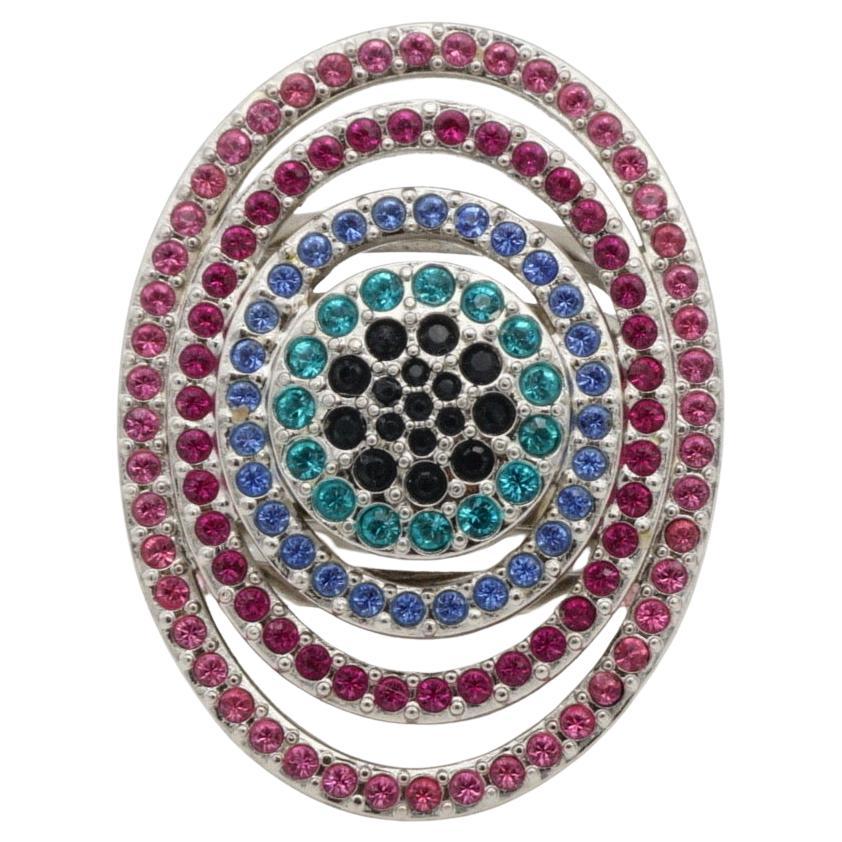 Swarovski Luxury Rainbow Crystals Oval Openwork Chunky Nirvana Cocktail Chunky Ring, Silver Tone

Cristaux de couleurs différentes sur chaque ovale. Rose, violet, vert, noir... Cristaux transparents de chaque côté.

En parfait état. Très rare à