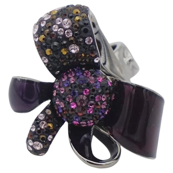 Swarovski Nirvana Cocktail Purple Flower Ribbon Bow Ring, Silver Plated, Size 52 UK L

Very good condition. 100% genuine.

Glamorous crystal has been exquisitely crafted with numerous glittering facets, perfectly designed to form a subtle flower