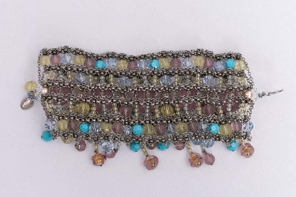 SWAROVSKI - (Made in France) Silvery metal bracelet with glass pearls in pastel tones.

Additional information:
Condition: Very good condition
Dimensions: Length: 20 cm - Width: 6.5 cm
 
Seller Reference: BRA281
