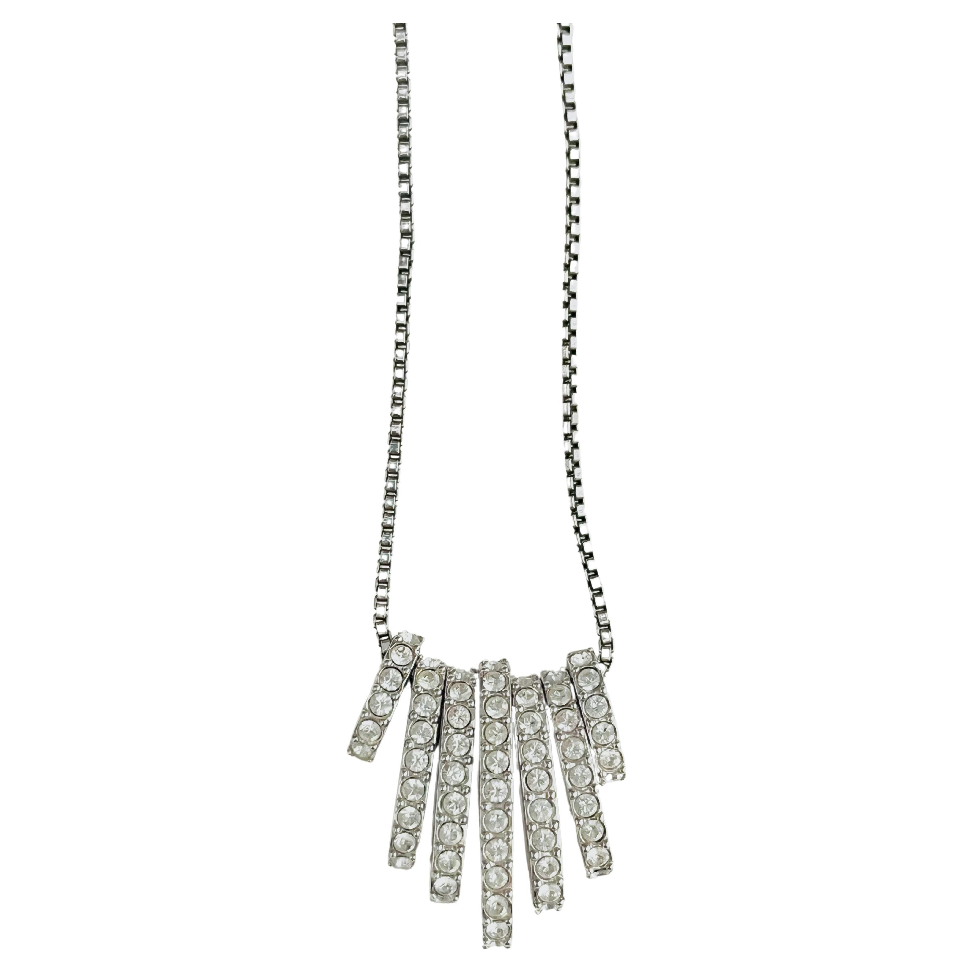 Swarovski 7 Siete Aros Intercambiables Glitter Blanco Cristales Transparentes Colgante Collar Versátil, Tono Plata

Muy buen estado y muy nuevo. Viene con caja original. 100% original. 

7 aros de cristales diferentes, con los que podrás hacer