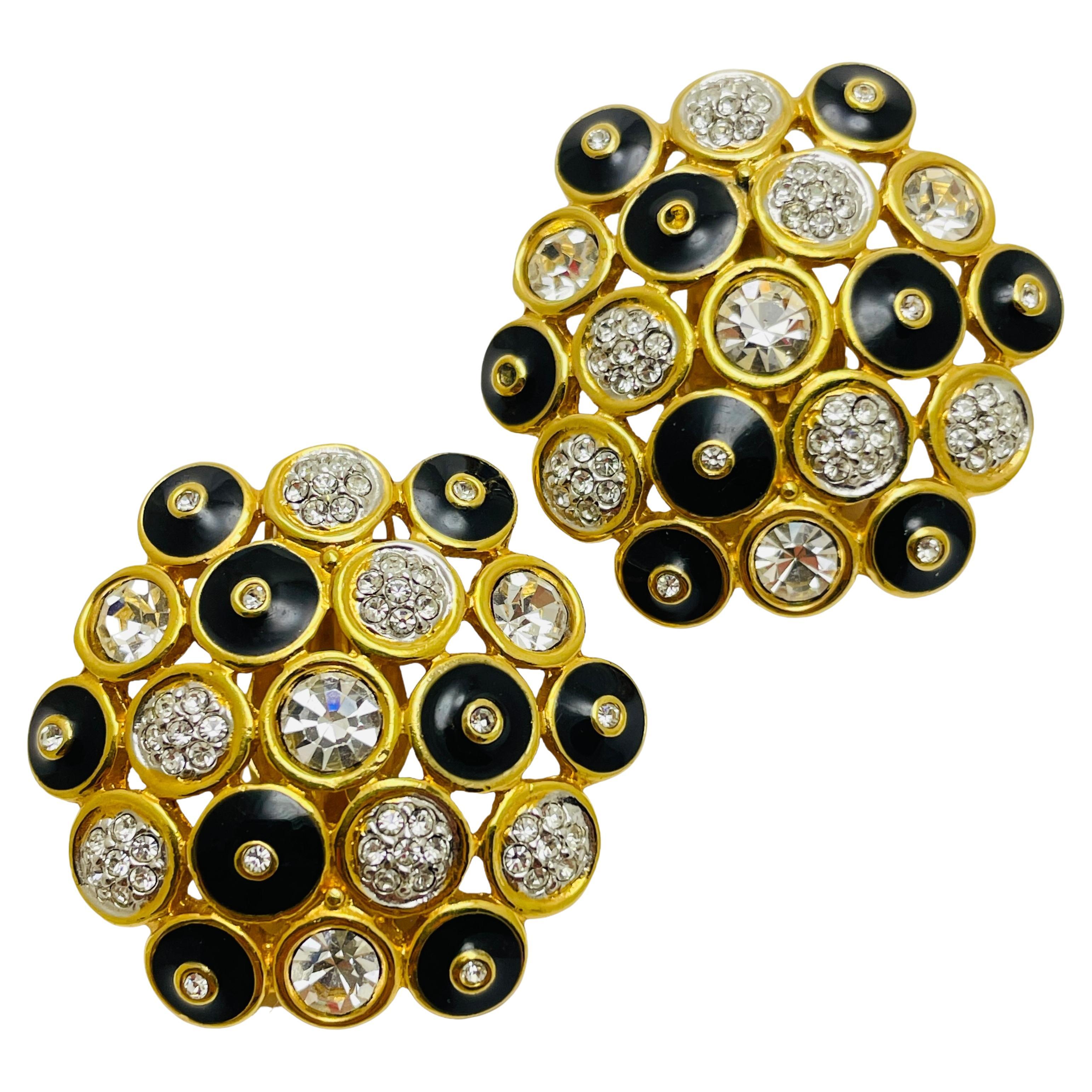 Orecchini a clip da passerella firmati Swarovski in oro e cristallo smaltato