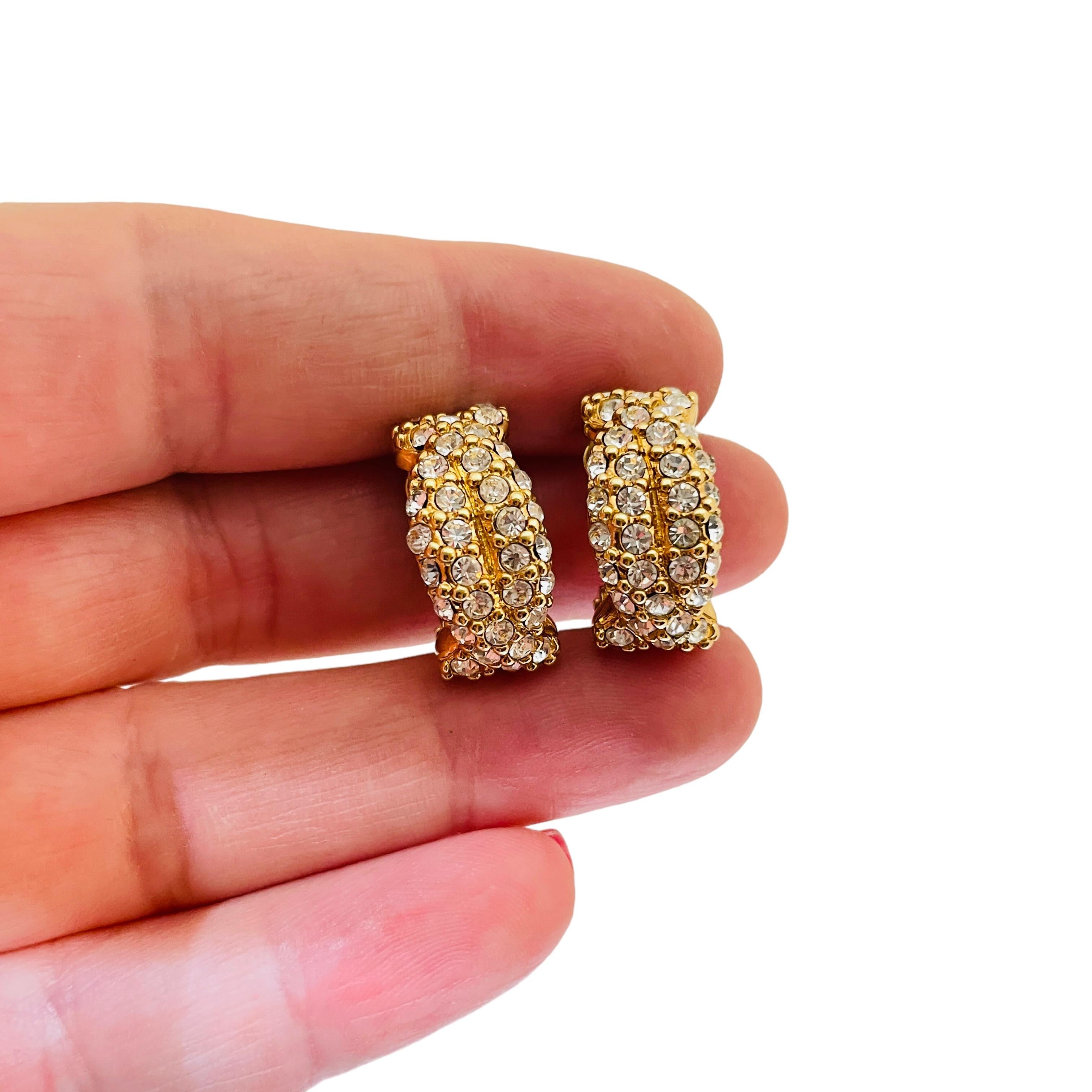 Women's SWAROVSKI signed vintage gold plated crystals designer runway clip on earrings For Sale