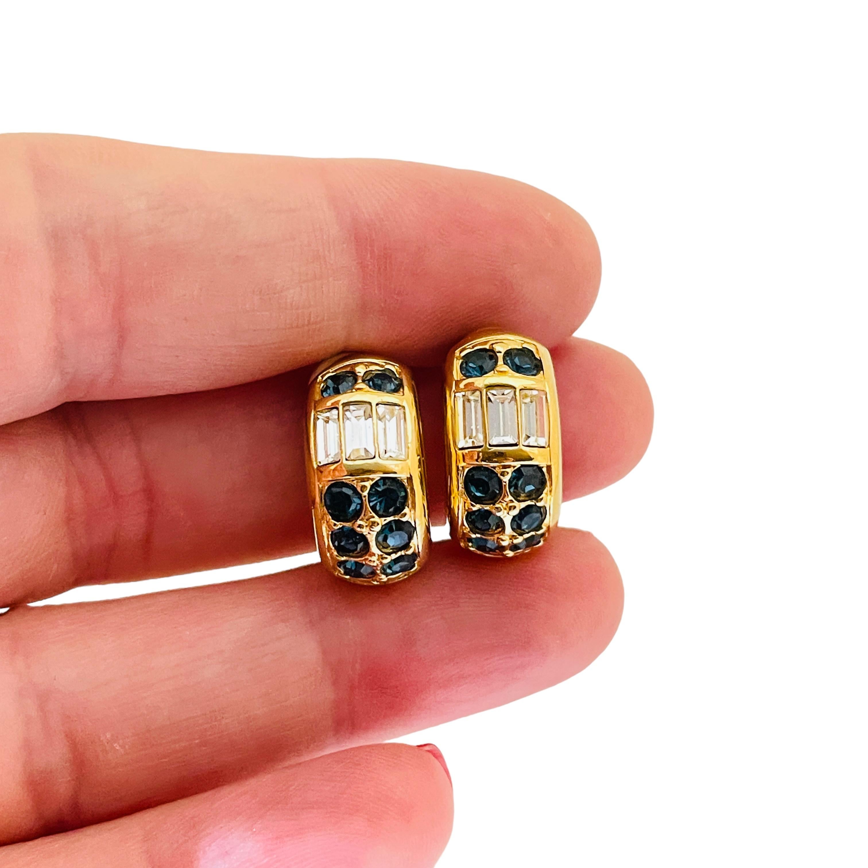 Women's SWAROVSKI signed vintage gold plated crystals designer runway clip on earrings For Sale
