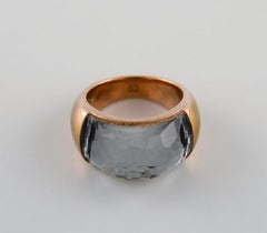 Swarovski signet ring in gold tone adorned with smoky quartz.