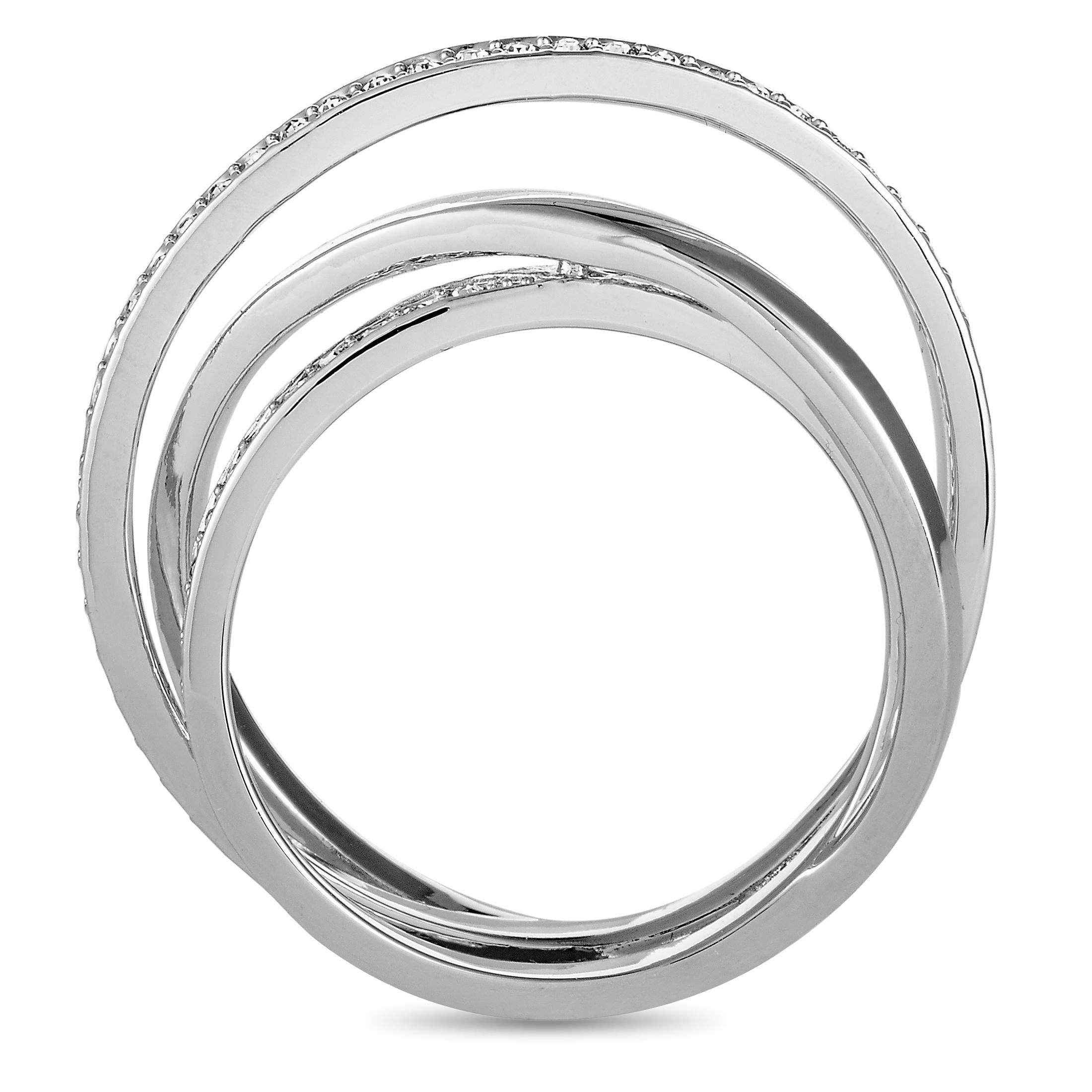 The Swarovski “Spiral” ring is made out of rhodium-plated stainless steel and crystals, and weighs 4.1 grams. It boasts band thickness of 5 mm and top height of 7 mm, while top dimensions measure 25 by 5 mm.
 
 Offered in brand new condition, this