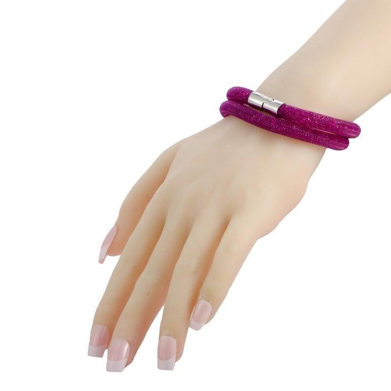Another exceptionally exuberant and enchantingly feminine item from the glorious Stardust collection, this gorgeous bracelet from Swarovski captures the essence of the brandâ€™s famous style by offering an enticing sparkle and passionate color. The