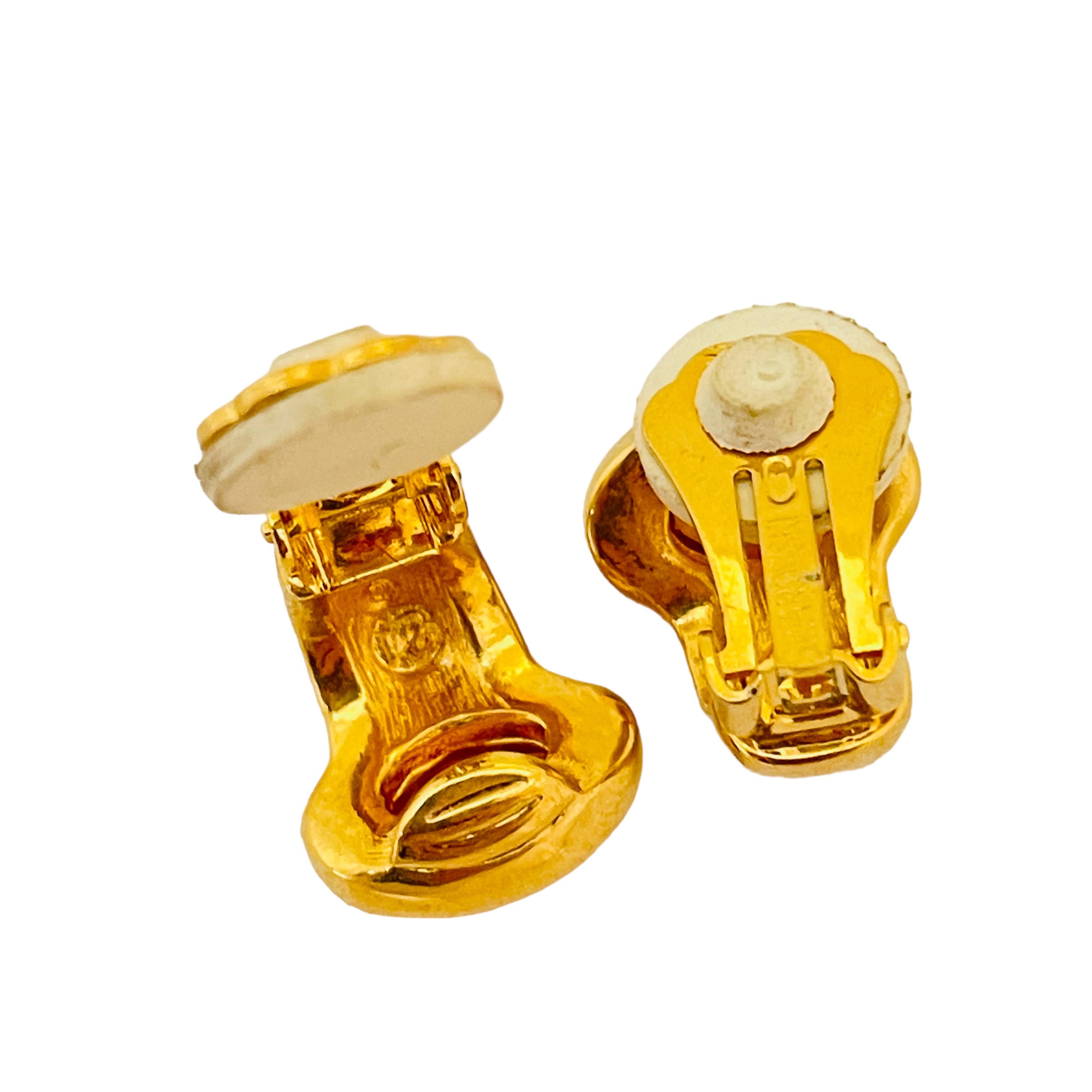 SWAROVSKI swan gold plated crystal clip on designer earrings In Good Condition For Sale In Palos Hills, IL