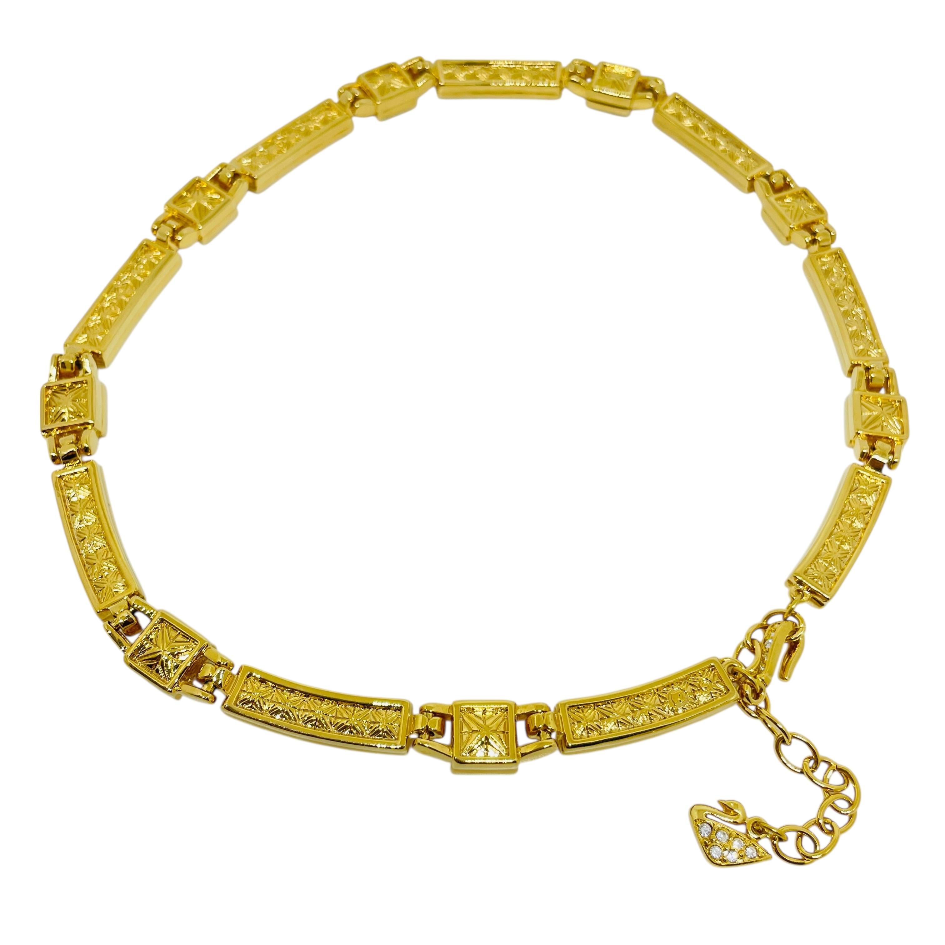 da uomo o donna Collana firmata SWAROVSKI con logo del cigno, placcata in oro e con cristalli di ametista in vendita