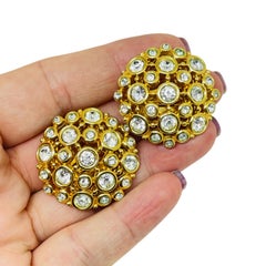 SWAROVSKI swan logo signed vintage gold plated crystal designer clip on earrings