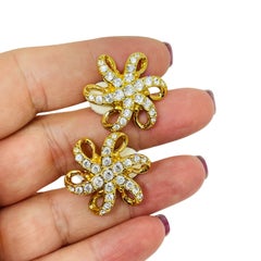 SWAROVSKI swan logo signed vintage gold plated crystal designer clip on earrings