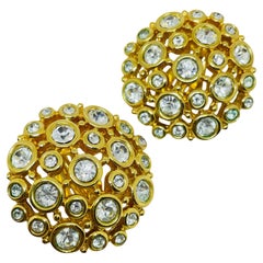 SWAROVSKI swan logo signed vintage gold plated crystal designer clip on earrings