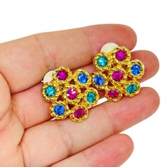 SWAROVSKI cisne firmado chapado en oro cristales flor de diseño clip en pendientes