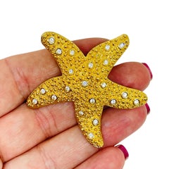 SWAROVSKI cigno firmato con cristalli placcati oro stella marina spilla figurata di design