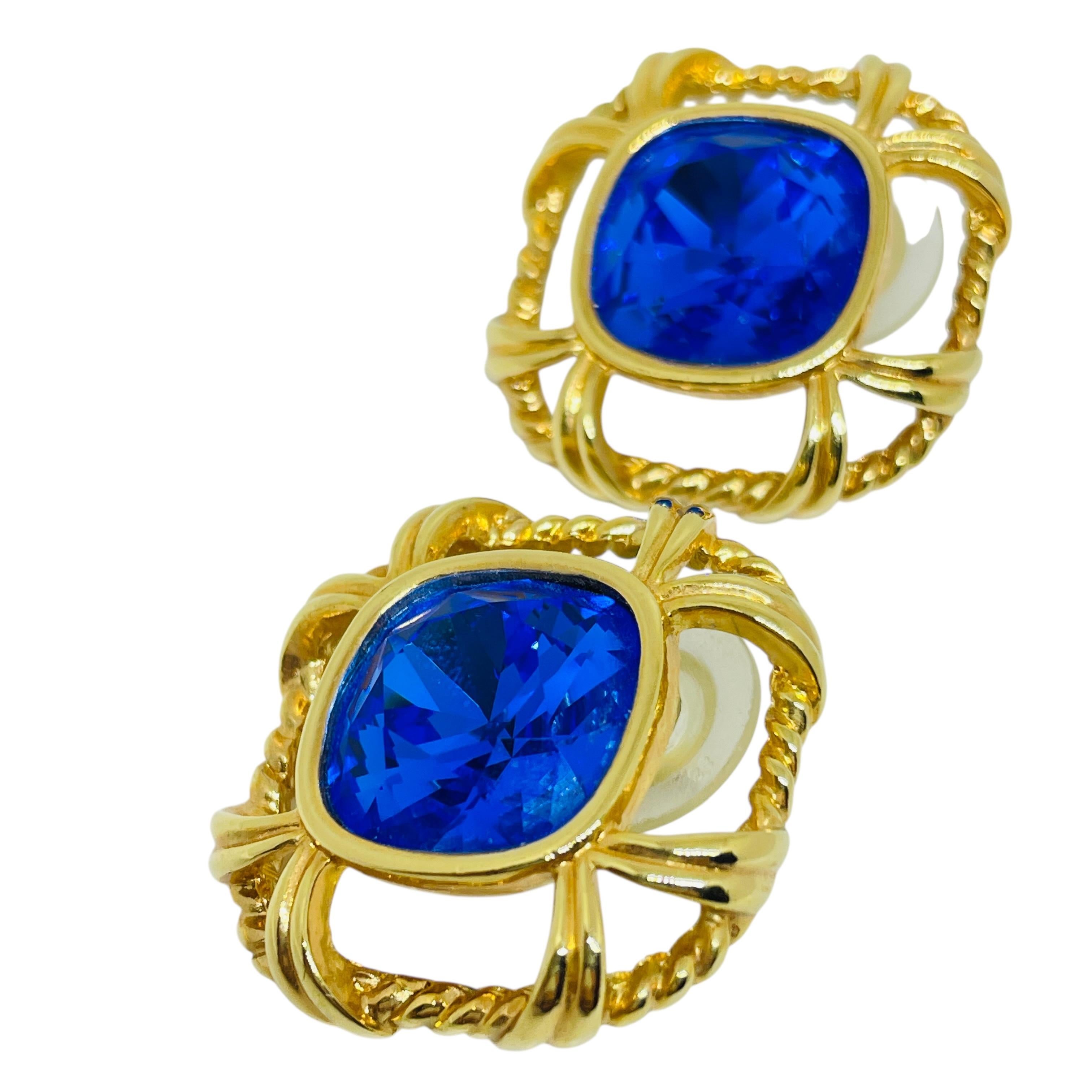 Women's or Men's SWAROVSKI swan signed gold plated sapphire crystal designer 80's post earrings For Sale