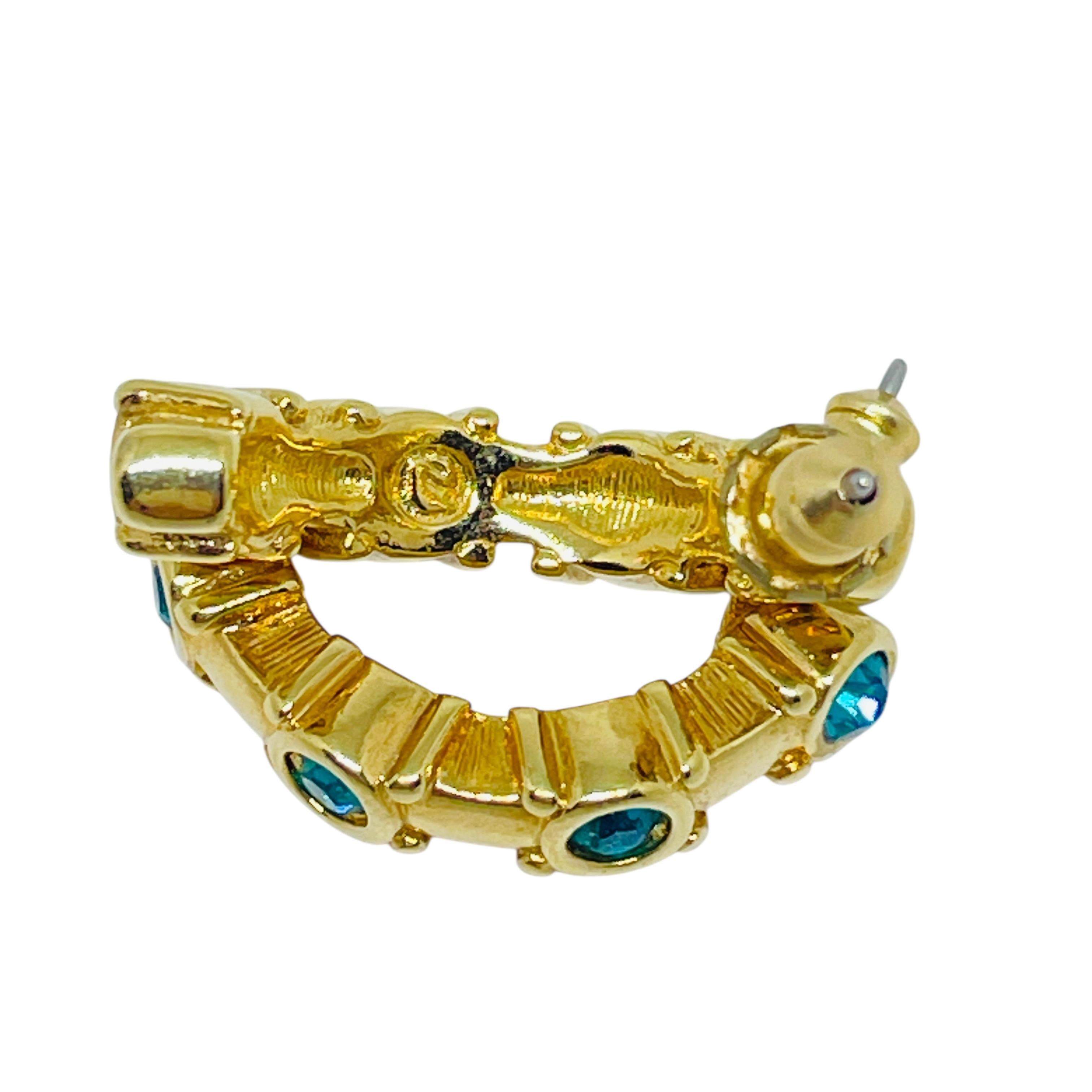 SWAROVSKI swan signed vintage gold emerald crystals designer small hoop earrings In Good Condition For Sale In Palos Hills, IL