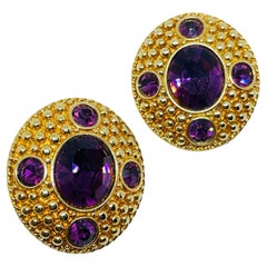 SWAROVSKI swan signed vintage gold plated amethyst crystal clip on earrings