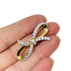 SWAROVSKI cygne signé vintage plaqué or cristaux noeud broche designer