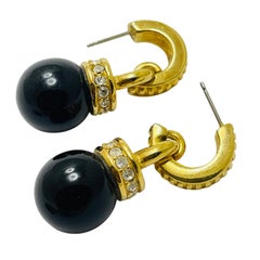 SWAROVSKI swan signed vintage gold plated glass designer earrings