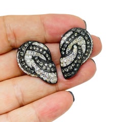 Boucles d'oreilles à clip vintage Swarovski en cristal argenté, ornées d'un cygne, signées par le créateur