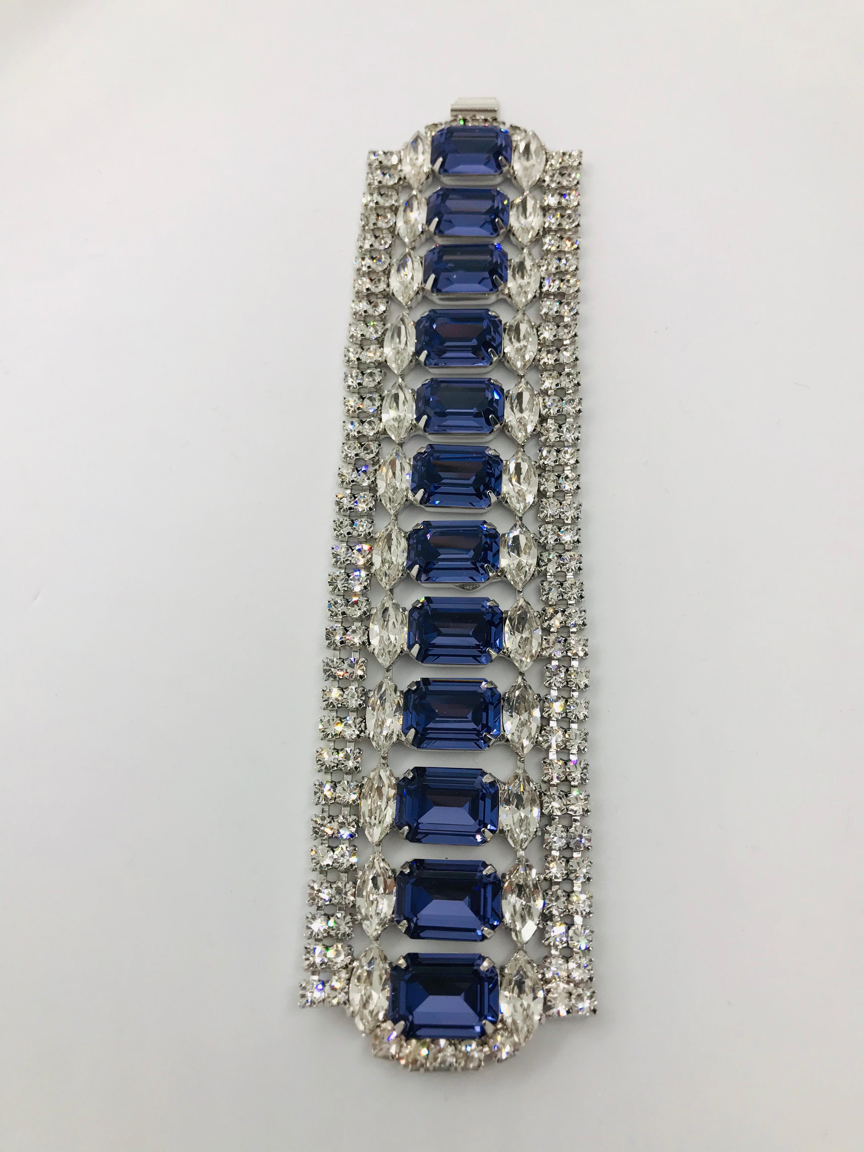 Our Swarovski tanzanite and vintage Austrian crystal flex cuff bracelet looks like it has just stepped out of a Hollywood movie!  Feel like a movie star in this glamorous flex bracelet that features a row of Swarovski tanzanite octagons surrounded