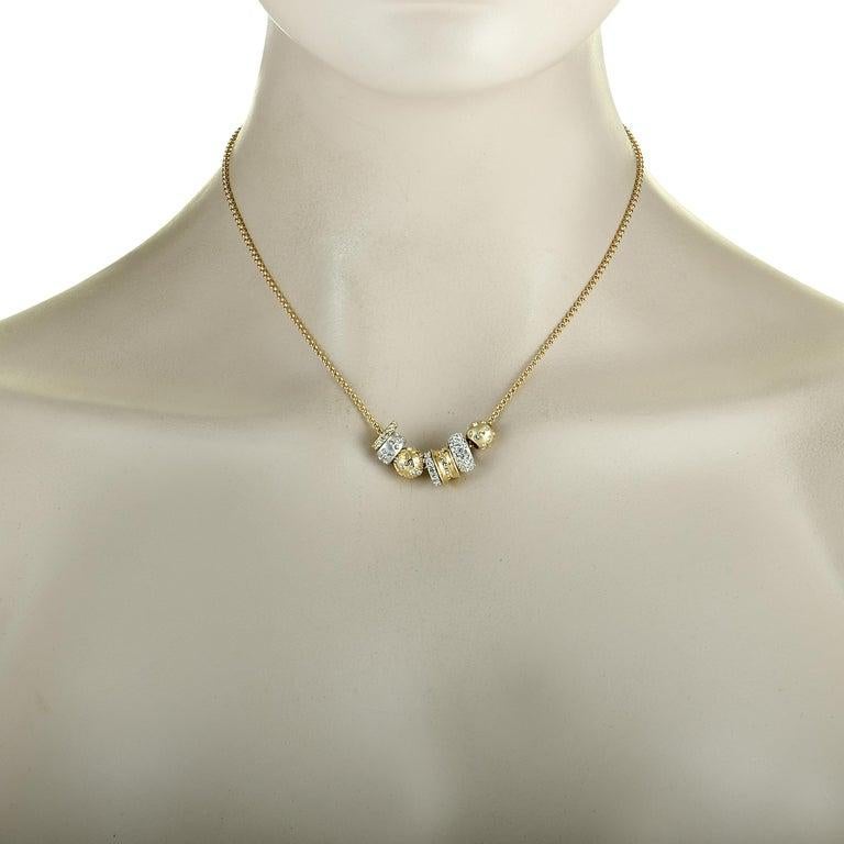 Die gelbvergoldete und rhodinierte Halskette â€žTe Kauriâ€œ von Swarovski ist mit Kristallen besetzt und wiegt 17,1 Gramm. Die Kette ist 15.00â€ lang und hat einen Karabinerverschluss. Der Anhänger ist 1.50â€ lang und 0.45â€ breit. Dieses
