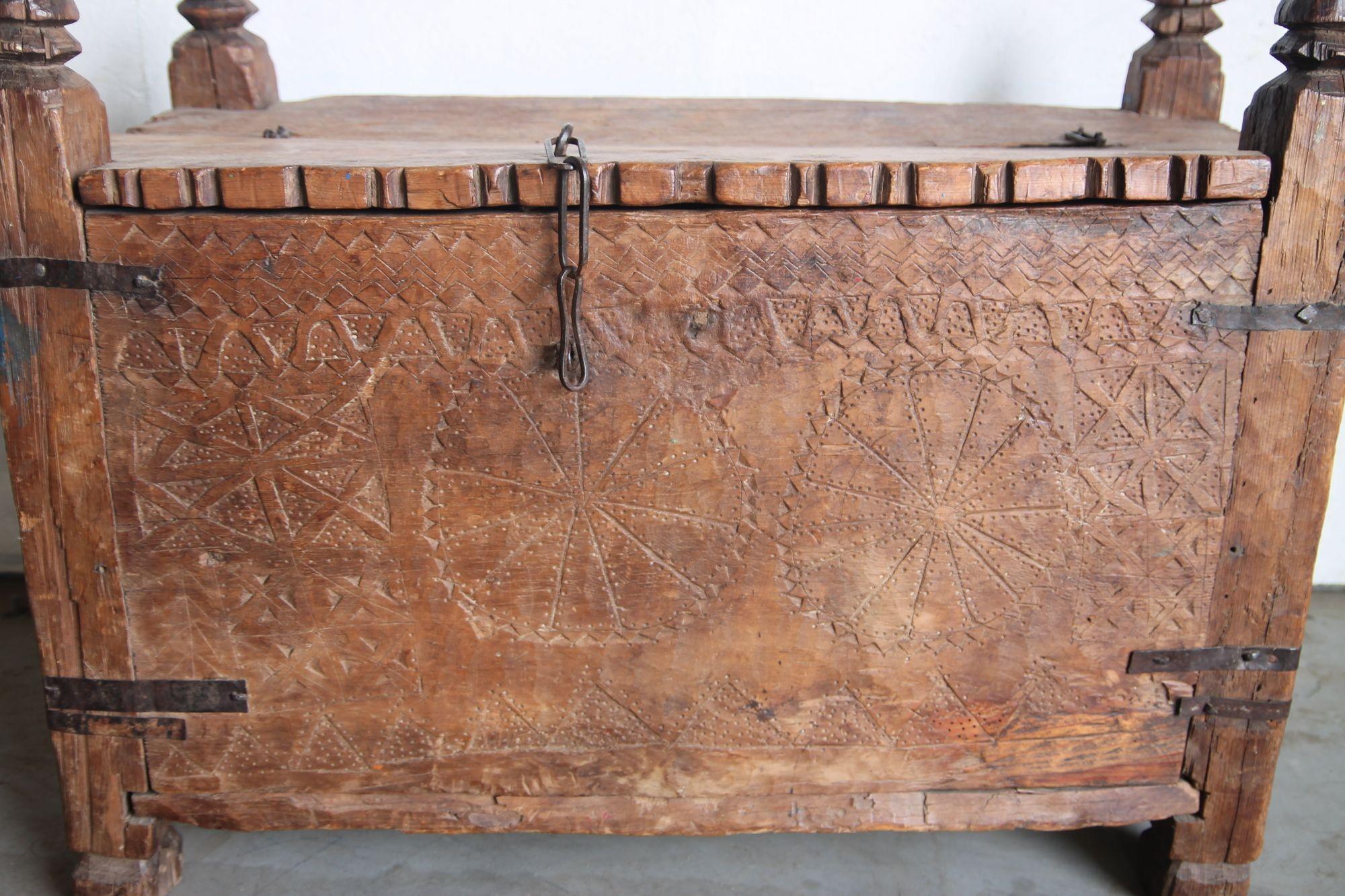 A great vintage hand carved chest from the Swat Valley. This turn of the century piece has carved symbols in the front and still retains its original chain lock and hinges.