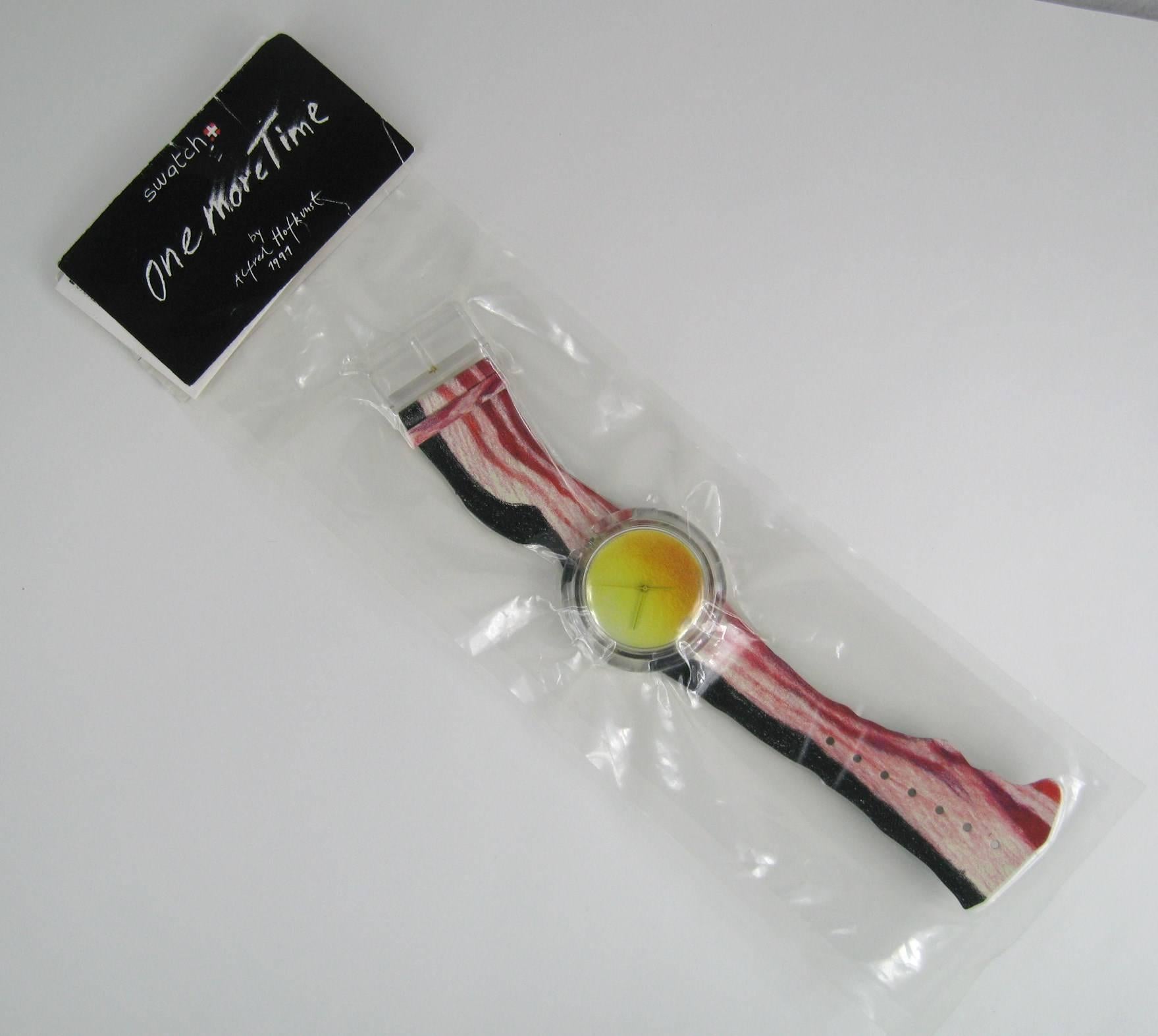 1991 Bonjuhr Artist Series Swatch montre #334/9999. Jamais porté ou sorti de l'emballage. Bonju(h)r est une tranche de bacon
frisé et rayé, puis croustillant au poignet. La montre est toujours dans son emballage plastique d'origine. Je l'ai achetée