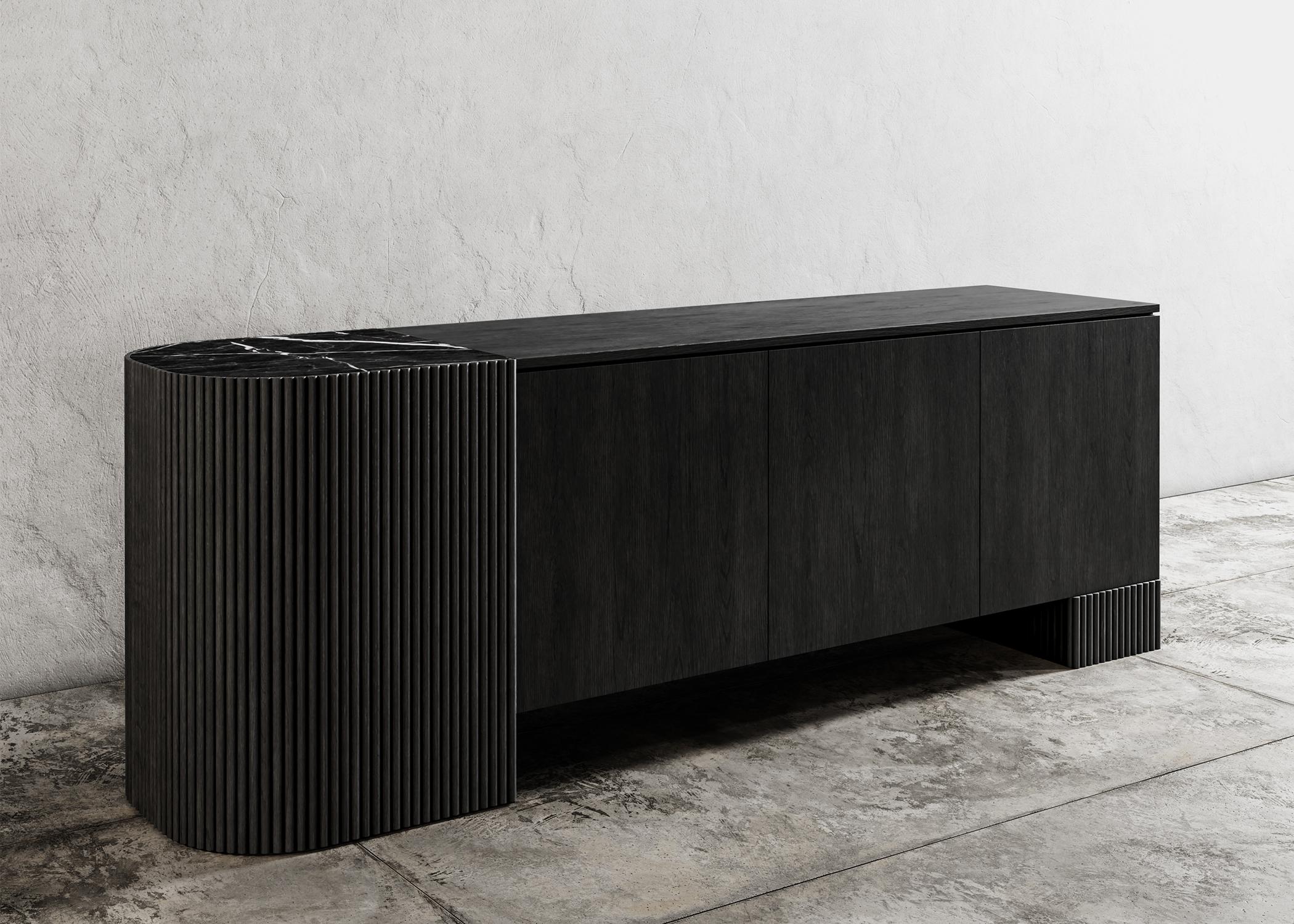 SWAY CREDENZA - Modern Design with Ebony Oak + Nero Marquina Marble

The Sway Credenza is a stylish and modern piece of furniture that will elevate the decor of any living space. Crafted from high-quality Ebony Oak wood and featuring a Nero Marquina