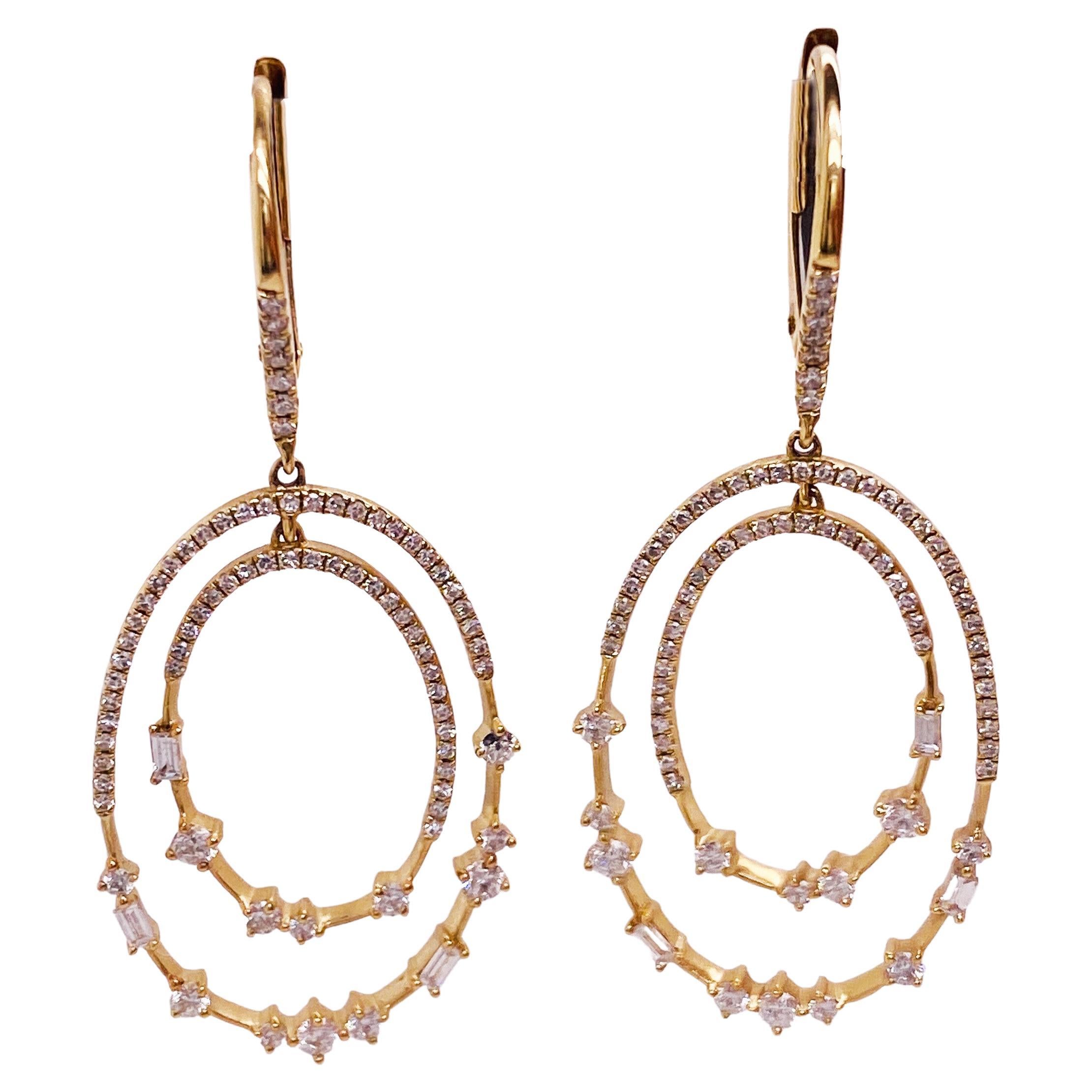 These earrings are a statement piece that will become fast favorites! Pair these lovelies with any outfit to add a perfect sparkle. The two diamond-covered ovals are linked to allow their own sway for a beautiful bit of sass and extra sparkle. The