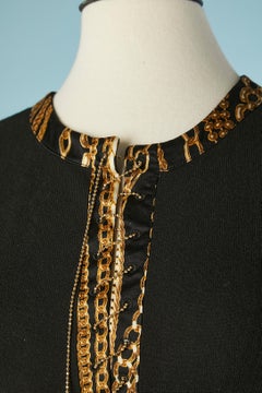 Sweater and printed trouser ensemble with gold metallic chains Roberto Cavalli