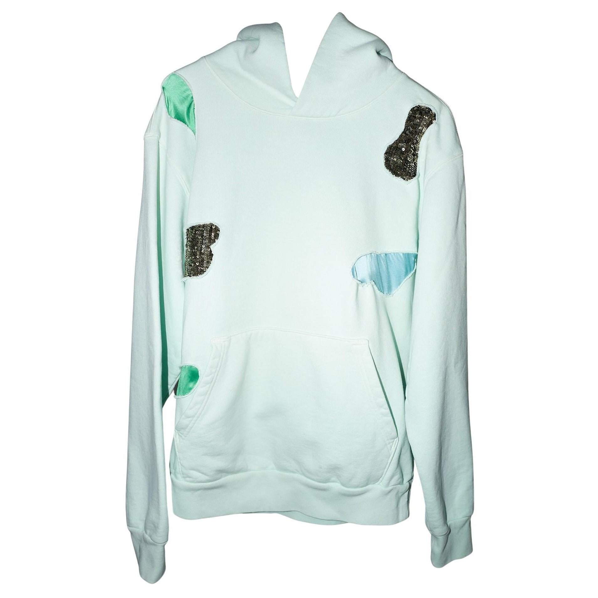 Sweatshirt  Organic Cotton Hoodie Mint Green Silk Sequin Patch Work
Brand: J Dauphin


Available in Size Small, Medium or Large


The sweatshirts express a hybrid of easy-luxe and bourgeoisie jet-set look. Effortless and versatile, elegant and