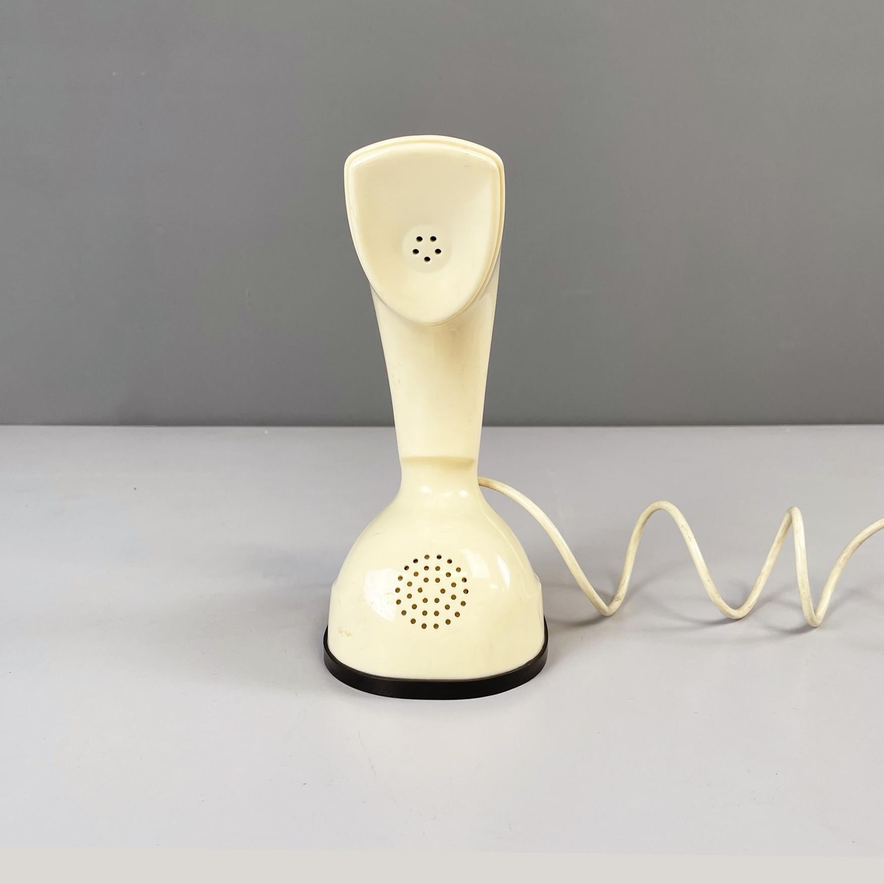 Sweden mid-century Beige plastic desk phone Ericofon Cobra by Ericsson, 1950s
Desk phone mod. Ericofon, also known as Cobra, a rounded base in creamy beige plastic. The peculiarity of this telephone is that both the transmitter and the receiver stay